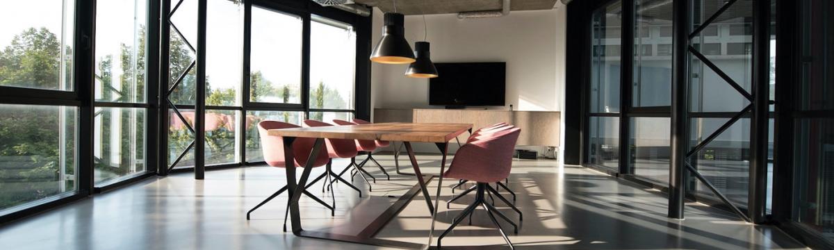 View of a board room table with chairs