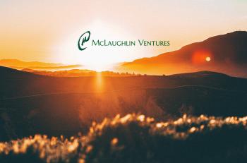 Golden sunset with McLaughlin Logo overlaid